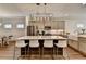 Modern kitchen island with seating and stainless steel appliances at 2225 Nena Way, Tucker, GA 30084