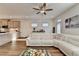 Bright living room featuring modern furniture, hardwood floors, and dining area at 2225 Nena Way, Tucker, GA 30084