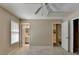 Bedroom features neutral colors, carpet, and a view of the bathroom at 30 Plantation Ne Dr # B, Atlanta, GA 30324