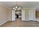 Inviting dining room featuring an elegant chandelier and seamlessly connects to the stylish kitchen at 30 Plantation Ne Dr # B, Atlanta, GA 30324