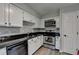Modern kitchen with stainless steel appliances and black countertops, perfect for cooking enthusiasts at 30 Plantation Ne Dr # B, Atlanta, GA 30324
