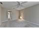 Spacious main bedroom with carpet and access to an ensuite bathroom, creating a private retreat at 30 Plantation Ne Dr # B, Atlanta, GA 30324
