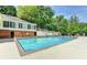 Enjoy the community pool with ample seating and building access in a brick pool house at 30 Plantation Ne Dr # B, Atlanta, GA 30324