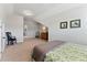 Inviting bedroom featuring a cozy bed, chair, and ample room for relaxation at 3172 Havencroft Ne Dr, Roswell, GA 30075