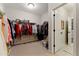 Spacious walk-in closet with ample shelving and hanging space, ready for organization at 3172 Havencroft Ne Dr, Roswell, GA 30075