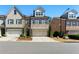 Charming brick-front townhome with a two-car garage and well-manicured landscaping at 3172 Havencroft Ne Dr, Roswell, GA 30075