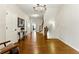 Entryway featuring hardwood floors, staircase and multiple doorways at 3172 Havencroft Ne Dr, Roswell, GA 30075