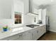 Modern kitchen with stainless steel appliances, granite countertops and hardwood floors at 3172 Havencroft Ne Dr, Roswell, GA 30075