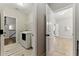 Convenient laundry room with modern appliances, plenty of storage, and easy access at 3172 Havencroft Ne Dr, Roswell, GA 30075