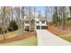 Charming two-story home with a well-manicured front lawn and a spacious driveway at 7170 Highbrook E Cir, Cumming, GA 30041