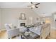Bright living room with vaulted ceilings, fireplace, and stylish furniture, creating a cozy atmosphere at 7170 Highbrook E Cir, Cumming, GA 30041