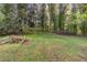 Lush backyard with mature trees and well-maintained lawn at 1753 Beechwood Sw Blvd, Atlanta, GA 30311