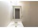 Bathroom featuring a vanity with chrome fixtures and a mirror above at 1753 Beechwood Sw Blvd, Atlanta, GA 30311