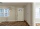 Bright entryway featuring a white door, awaiting renovation to restore its charm at 1753 Beechwood Sw Blvd, Atlanta, GA 30311
