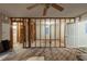 Spacious room showing exposed wall beams, ceiling fan, and potential for an open design at 1753 Beechwood Sw Blvd, Atlanta, GA 30311