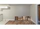 Room with exposed structure, offering an open space and the potential for customization at 1753 Beechwood Sw Blvd, Atlanta, GA 30311