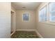 Neutral room featuring a window and a doorway, waiting for your personal touch at 1753 Beechwood Sw Blvd, Atlanta, GA 30311