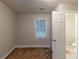 Simple room next to bathroom offers potential for bedroom or office conversion at 1753 Beechwood Sw Blvd, Atlanta, GA 30311