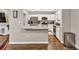 Beautiful kitchen features stainless steel appliances, island, and ample counter space at 214 Walton St, Loganville, GA 30052