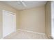 Neutral bedroom with plush carpeting, ceiling fan and a closet at 2368 Barrett Cottage # 17, Marietta, GA 30066