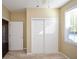 Neutral bedroom with vaulted ceiling, sliding closet doors and a window that allows ample natural light at 2368 Barrett Cottage # 17, Marietta, GA 30066