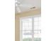Window letting in light to this carpeted bedroom with ceiling fan at 2368 Barrett Cottage # 17, Marietta, GA 30066