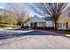Well-maintained building exterior featuring manicured landscaping and ample parking at 2368 Barrett Cottage # 17, Marietta, GA 30066