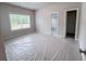 Bedroom with a window, closet, and neutral color scheme at 3292 Lions Ruby Ln, Atlanta, GA 30349