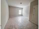 Bright bedroom with neutral walls and single window providing plenty of light at 3292 Lions Ruby Ln, Atlanta, GA 30349