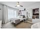 Stylish bedroom featuring a large window, trendy decor, and a comfortable bed at 728 Oakview Rd, Decatur, GA 30030