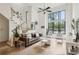 Bright living room with high ceilings, modern furnishings, and large window with natural light at 728 Oakview Rd, Decatur, GA 30030