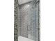 Modern shower with textured tile and glass door, creating a sleek and stylish design at 728 Oakview Rd, Decatur, GA 30030