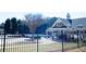 Fenced in community pool, lounging area and clubhouse at 5712 Kendrick Ln, Cumming, GA 30041
