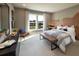 Stylish bedroom with unique headboard, gray walls, and comfortable decor at 6470 Pond View Dr, Cumming, GA 30028