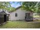 Exterior of home with a deck, shed and a partial view of a carport at 972 Sims Nw Ave, Atlanta, GA 30318
