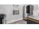 Modern kitchen with stainless steel appliances, granite countertops, and stylish cabinetry at 972 Sims Nw Ave, Atlanta, GA 30318