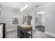 Updated kitchen with granite countertops, stainless steel appliances, and an island at 972 Sims Nw Ave, Atlanta, GA 30318