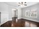 Bright living room featuring hardwood floors, a fireplace, and lots of natural light at 972 Sims Nw Ave, Atlanta, GA 30318