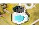 Aerial view of the community pool, complete with lap lanes, a splash fountain and lounge area at 13917 Homer Lane, Covington, GA 30014