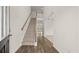 Bright open foyer features a hardwood floor and stairway to the upper level at 13917 Homer Lane, Covington, GA 30014