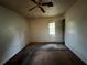 Bedroom featuring a ceiling fan and a window for natural light at 2369 Christian Cir, Covington, GA 30016