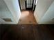Hallway featuring hardwood floors at 2369 Christian Cir, Covington, GA 30016