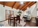 Inviting dining area with a fireplace and beautiful views at 3696 Suwanee Creek Ct, Suwanee, GA 30024