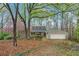 Inviting home featuring beautiful landscaping and a spacious two-car garage at 3696 Suwanee Creek Ct, Suwanee, GA 30024