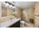 Modern bathroom featuring a glass shower, tile walls, and a vanity with a sink at 795 Hammond Dr # 1707, Atlanta, GA 30328