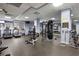 Spacious gym equipped with modern cardio machines, weightlifting equipment, and ample workout space at 795 Hammond Dr # 1707, Atlanta, GA 30328