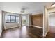 Bright living room with hardwood floors, floor-to-ceiling windows, and modern accents at 795 Hammond Dr # 1707, Atlanta, GA 30328