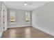Bedroom features lots of light, wood floors, and neutral paint scheme at 103 Candler Loop, Acworth, GA 30101