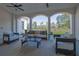 Enjoy the view from this covered patio with outdoor seating and ceiling fans at 103 Candler Loop, Acworth, GA 30101