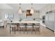 Bright kitchen with custom cabinets, a center island with seating, and stainless steel appliances at 103 Candler Loop, Acworth, GA 30101